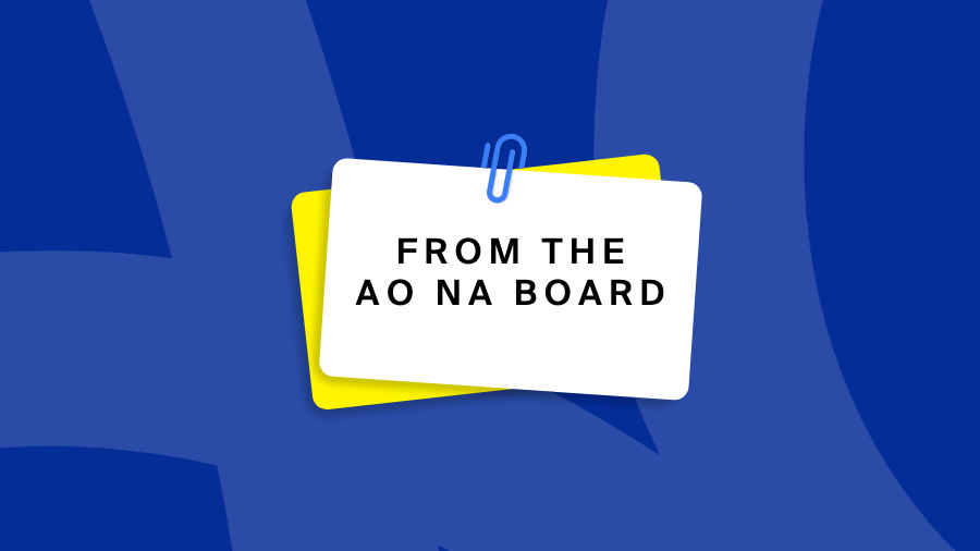 The text "From the AO NA Board" on stylized note cards, held together with a blue paperclip.